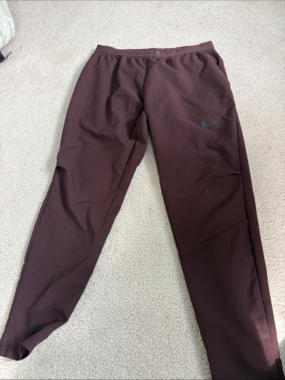 Nike Men's Burgundy Jogger Pants with Subtle Swoosh